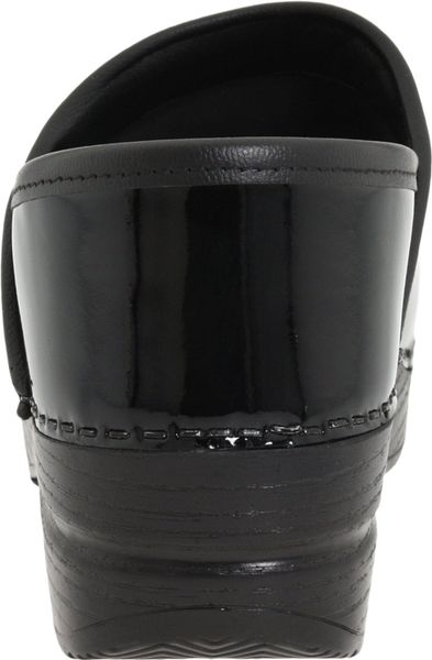 dansko black patent leather clogs