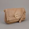 Tory Burch Logo Plaque Clutch in Beige (nude) - Lyst