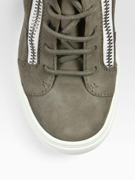 suede fringe sneakers