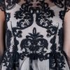 Alice + Olivia Peplum Lace Top in Black - Lyst
