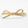 Kate Spade Skinny Mini Bow Bangle in White (gold/ clear crystal) - Lyst