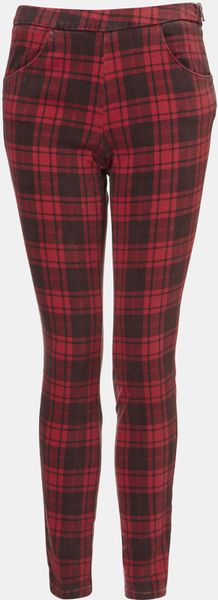 plaid pants with red side stripe