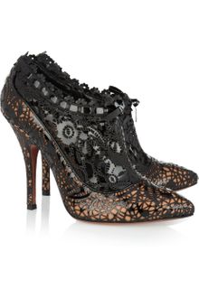 Alaïa Lasercut Patent Leather Ankle Boots - Lyst