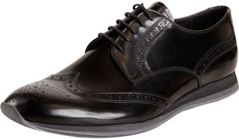 Prada Perforated Wingtip Blucher - Lyst