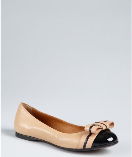 beige and black flats
