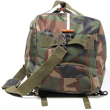 Herschel Supply Co. The Outfitter Duffle Bag in Green for Men (camo) | Lyst