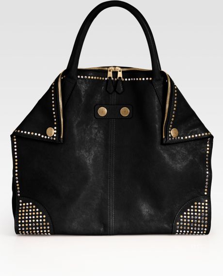 black alexander mcqueen with studs