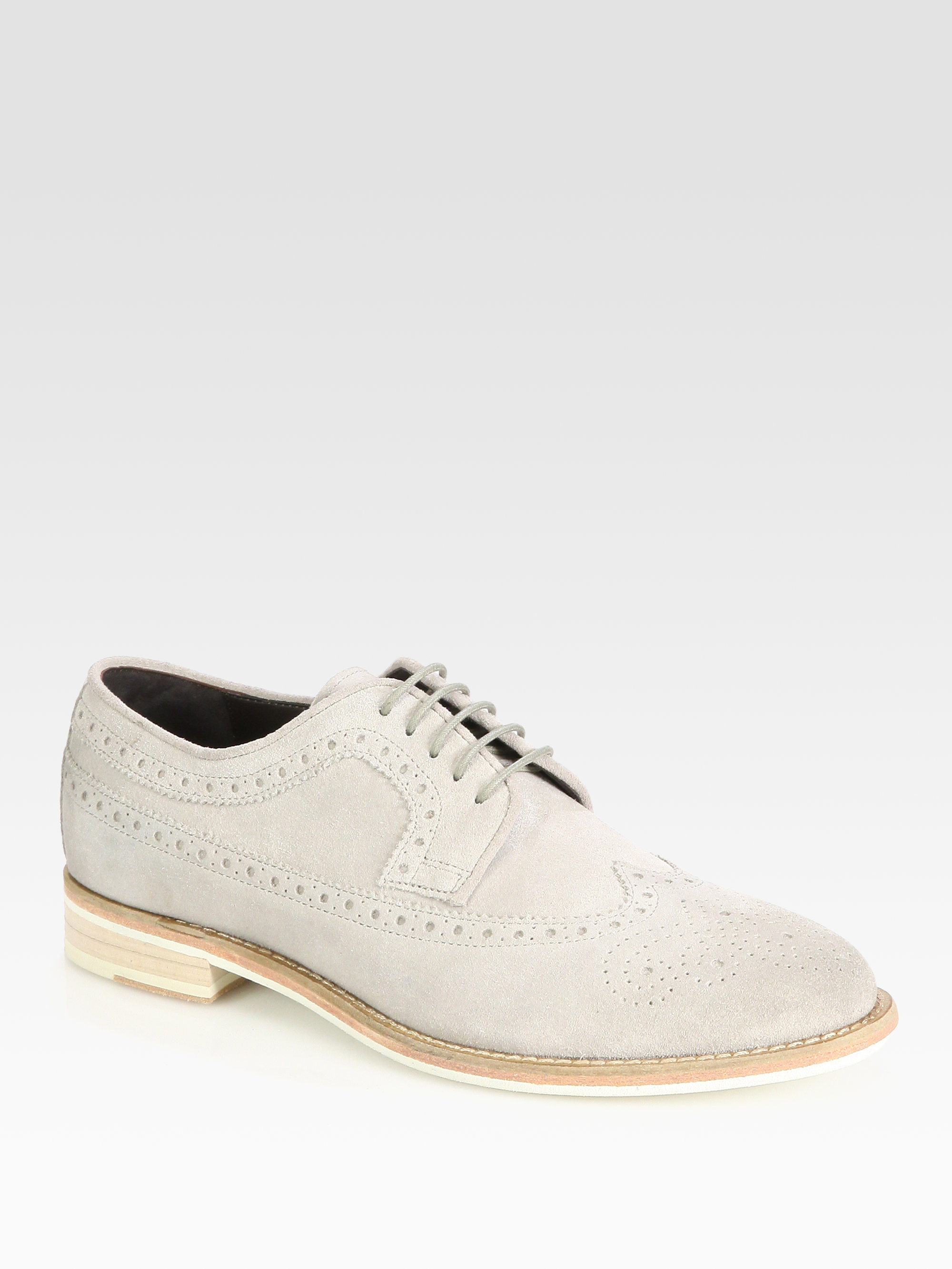 orange wingtip shoes