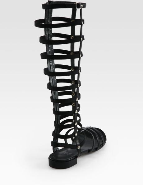 Stuart Weitzman Tall Gladiator Studded Leather Sandals in Black | Lyst