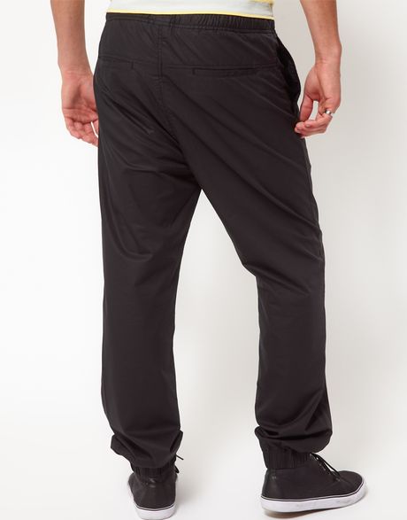 black jogging pants with white stripe