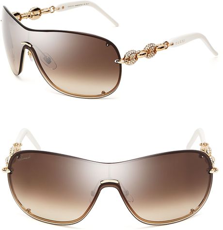 Gucci Chain Link Shield Sunglasses in Gold (GoldWhite)