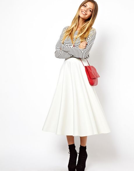 Hem Length Treat yourself to a day of delight spent floating in the Scoop of Sorbet Cream Tulle Maxi Skirt! Lovely cream tulle falls from a high Georgette waistband into a full and sweeping maxi skirt with voluminous organza beneath/5(13).