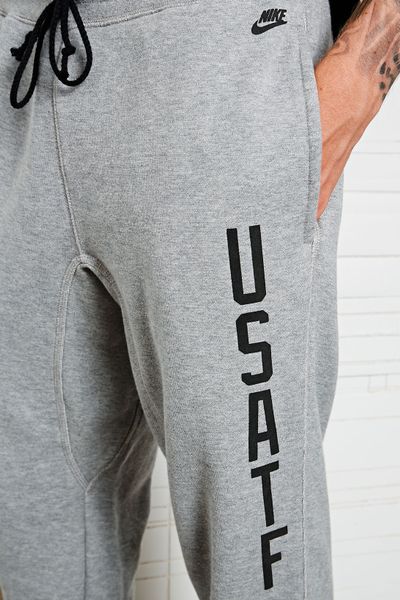 nike club cuffed sweatpants in gray
