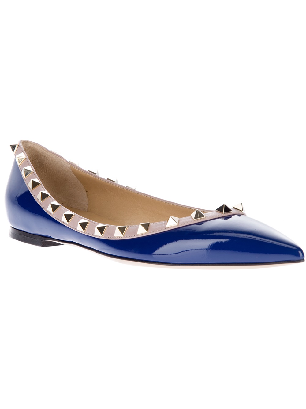 pointy tan flats