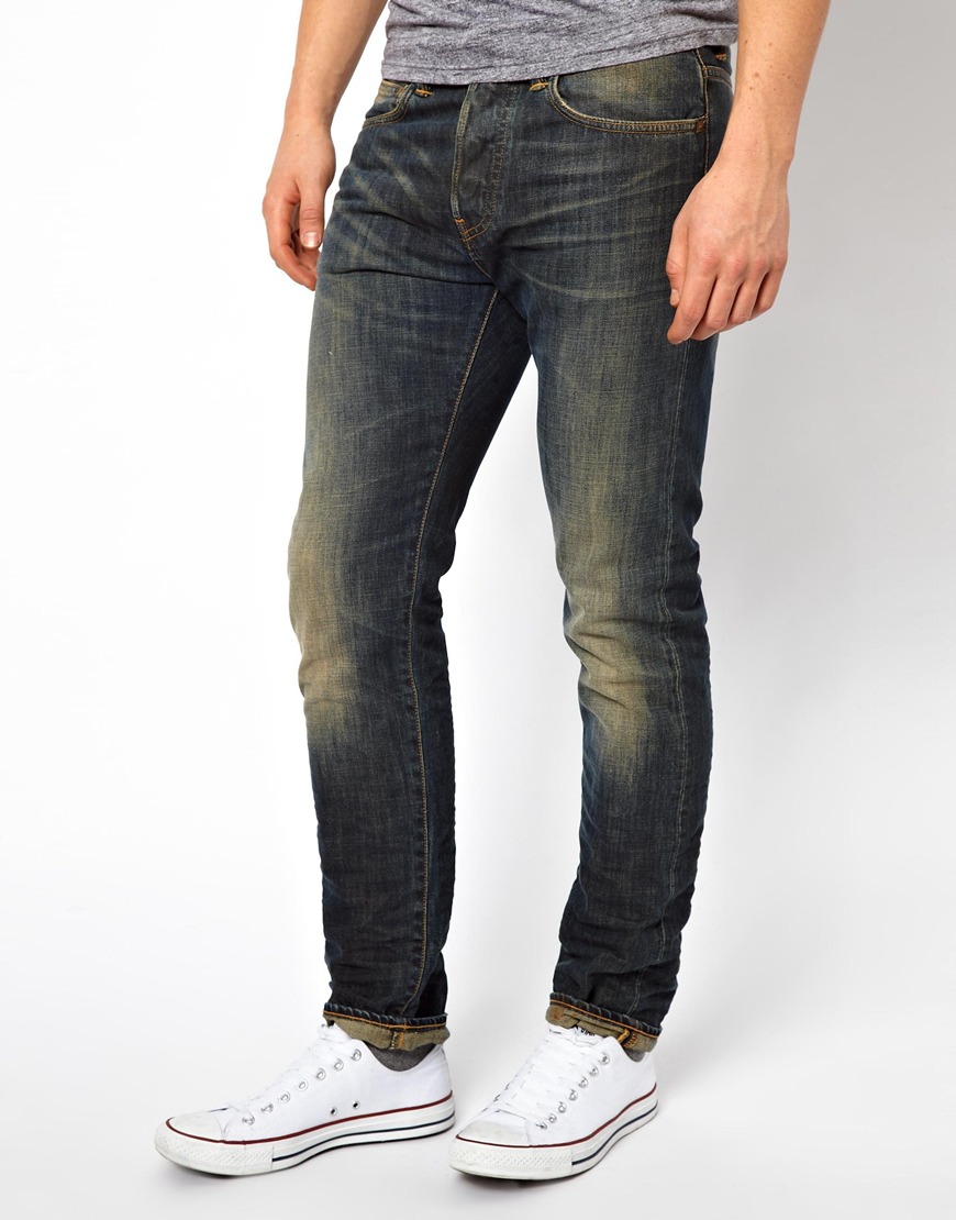 asos design baggy jeans in vintage blue wash with tint