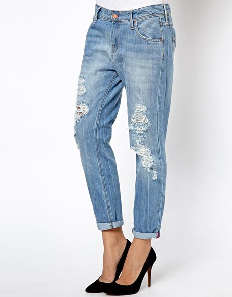 jeans with covered rips