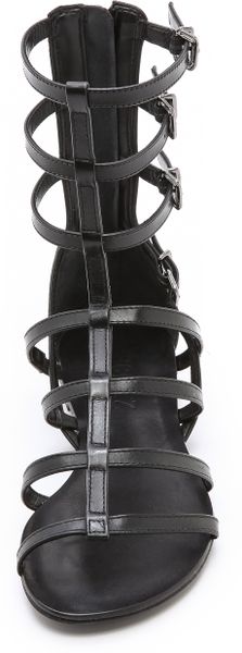schutz black flat sandals