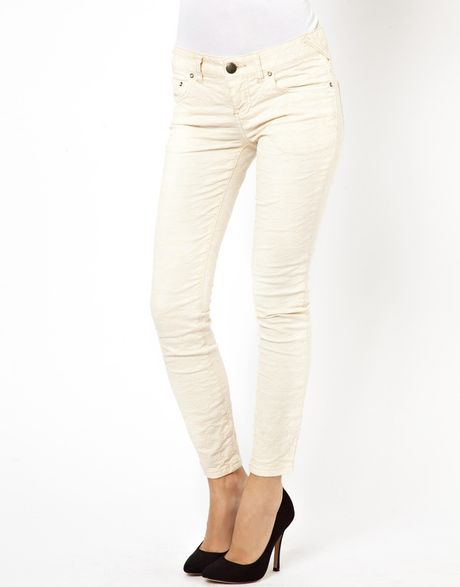 cream skinny jeans
