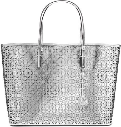 Michael Michael Kors Perforated Leather Floral Medium Travel Tote Bag in Silver | Lyst