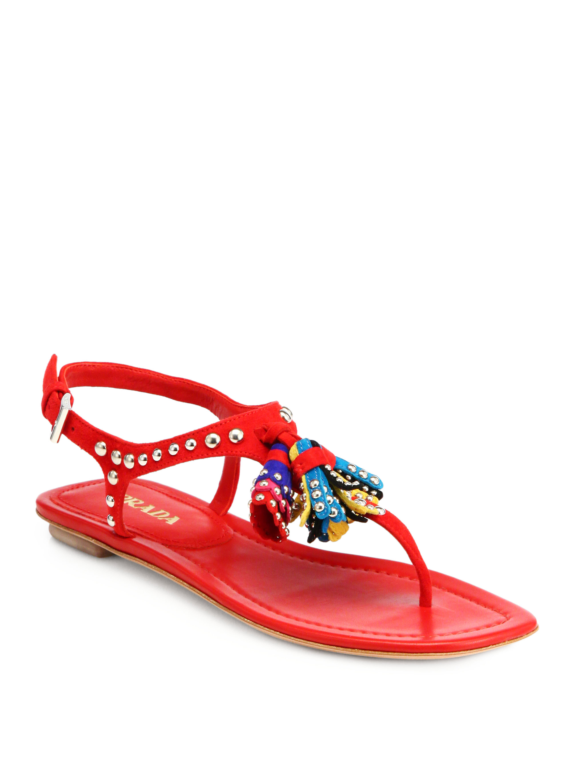 red sandals with tassels