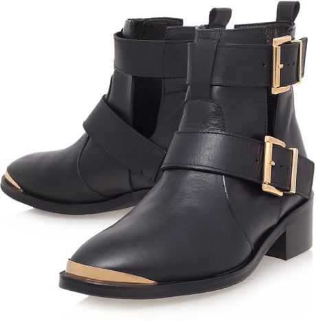 black leather boots with low heel