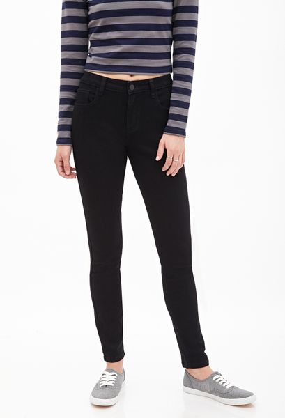 Forever 21 Mid-Rise Skinny Jeans in Black | Lyst