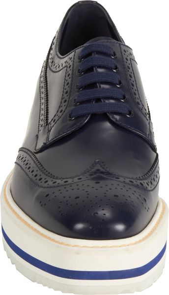 prada wingtip sneakers