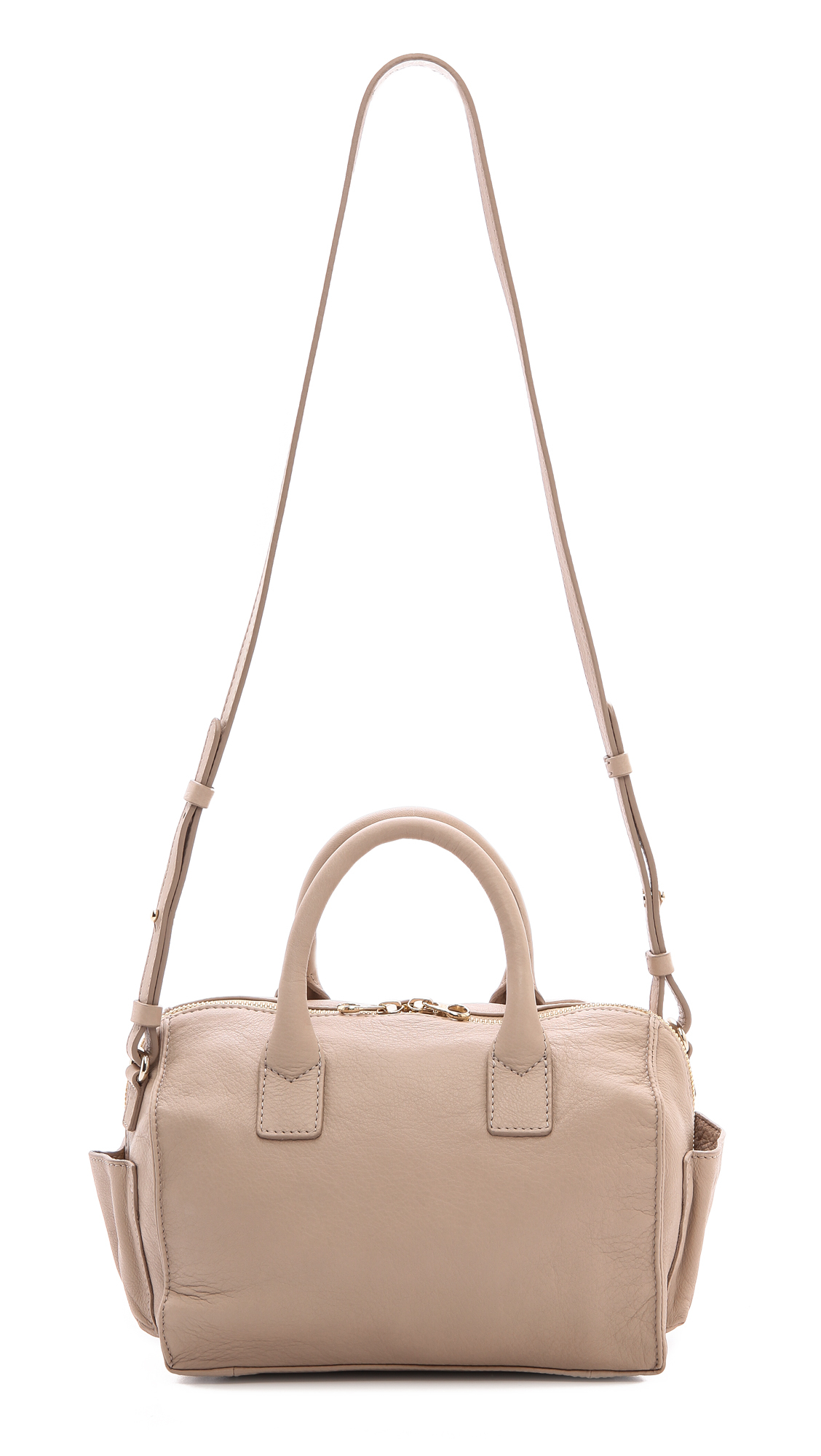 Small handbags with shoulder straps Our classic shoulder bag was designed as a timeless investment piece. Exquisitely crafted in Italy from curated combinations of Italian leather and suede, this piece is decidedly feminine yet entirely functional.