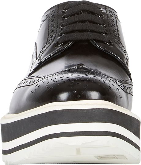 prada wingtip sneakers