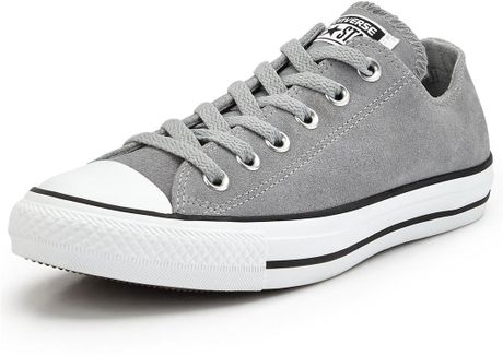 white and grey leather converse