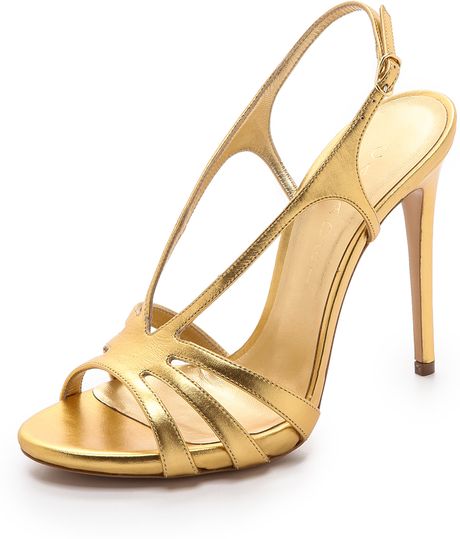 Casadei Strappy Heeled Sandals in Gold | Lyst