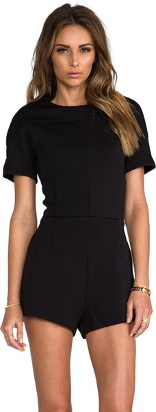 http://cdna.lystit.com/photos/d6b1-2014/01/30/t-by-alexander-wang-black-neoprene-short-sleeve-romper-product-1-15372880-2-637343457-normal_large_flex.jpeg