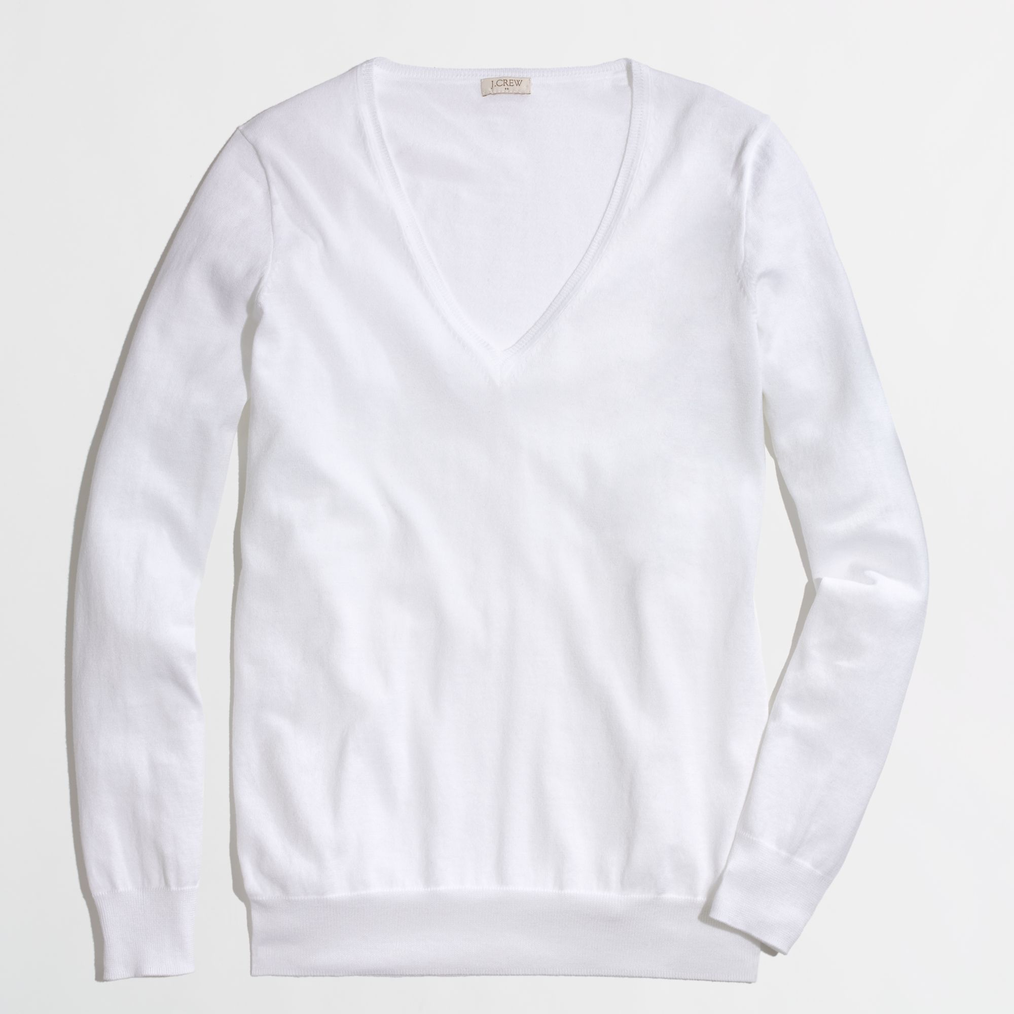 white cotton v neck sweater
