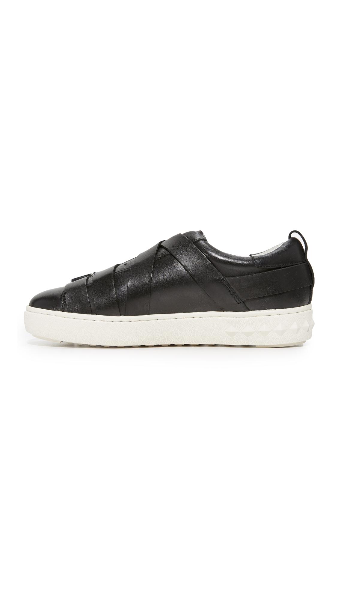 closures add a signature edge to these low-top ash sneakers