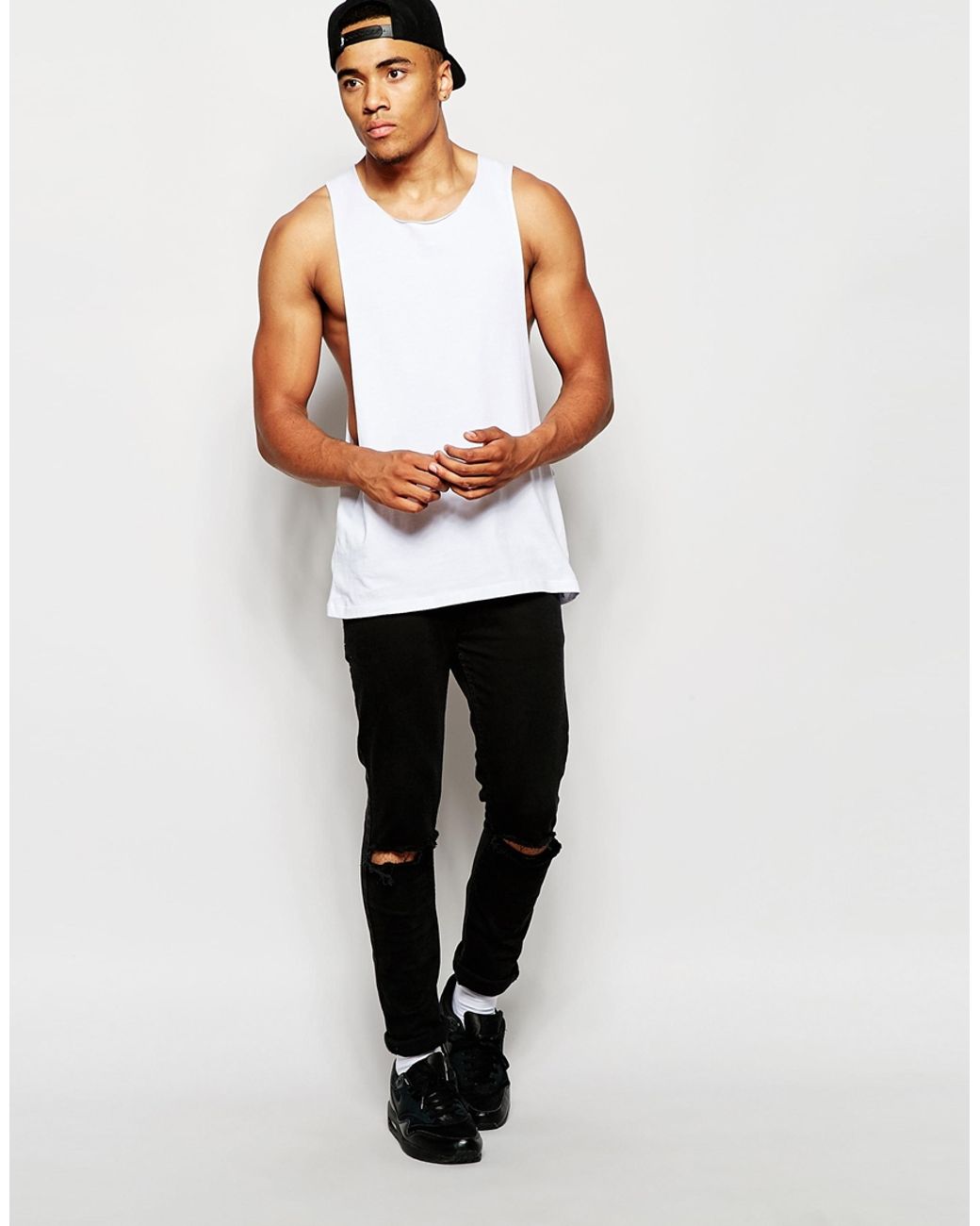 Men Sleeveless With Raw Edge And Contrast Raglan In White Black Tank Top  Wholesale Manufacturer & Exporters Textile & Fashion Leather Clothing Goods  with we have provide customization Brand your own