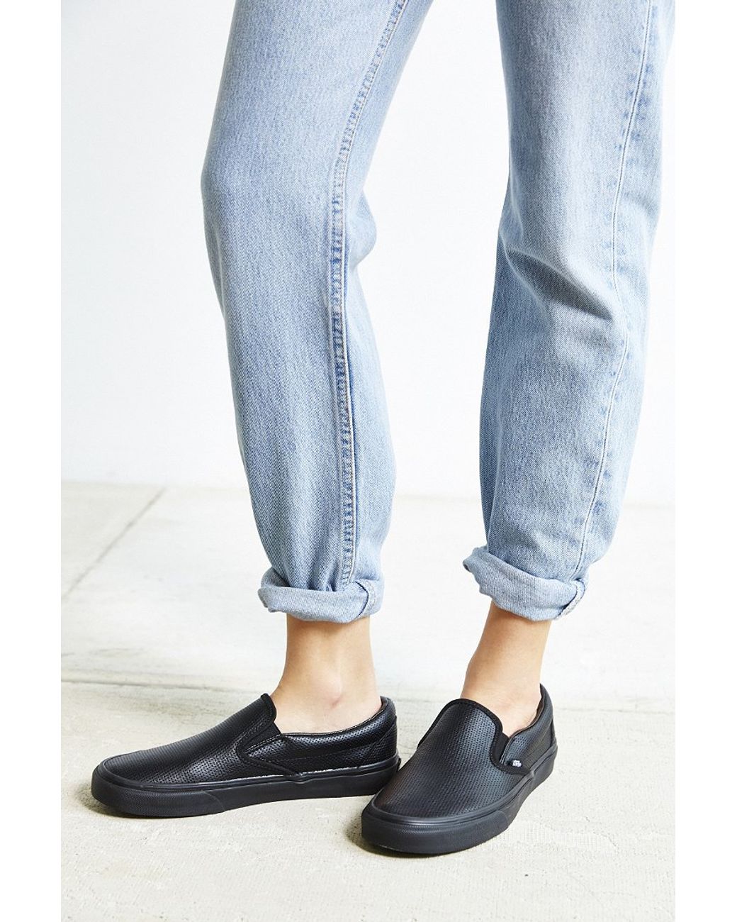 black perforated slip on