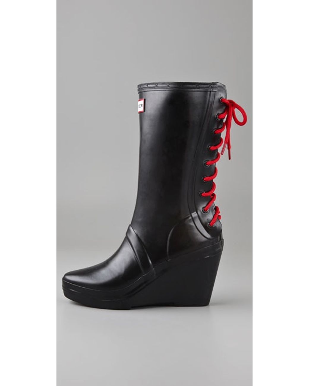 HUNTER Verbier Wedge Boots with Lace Up Detail in Black | Lyst