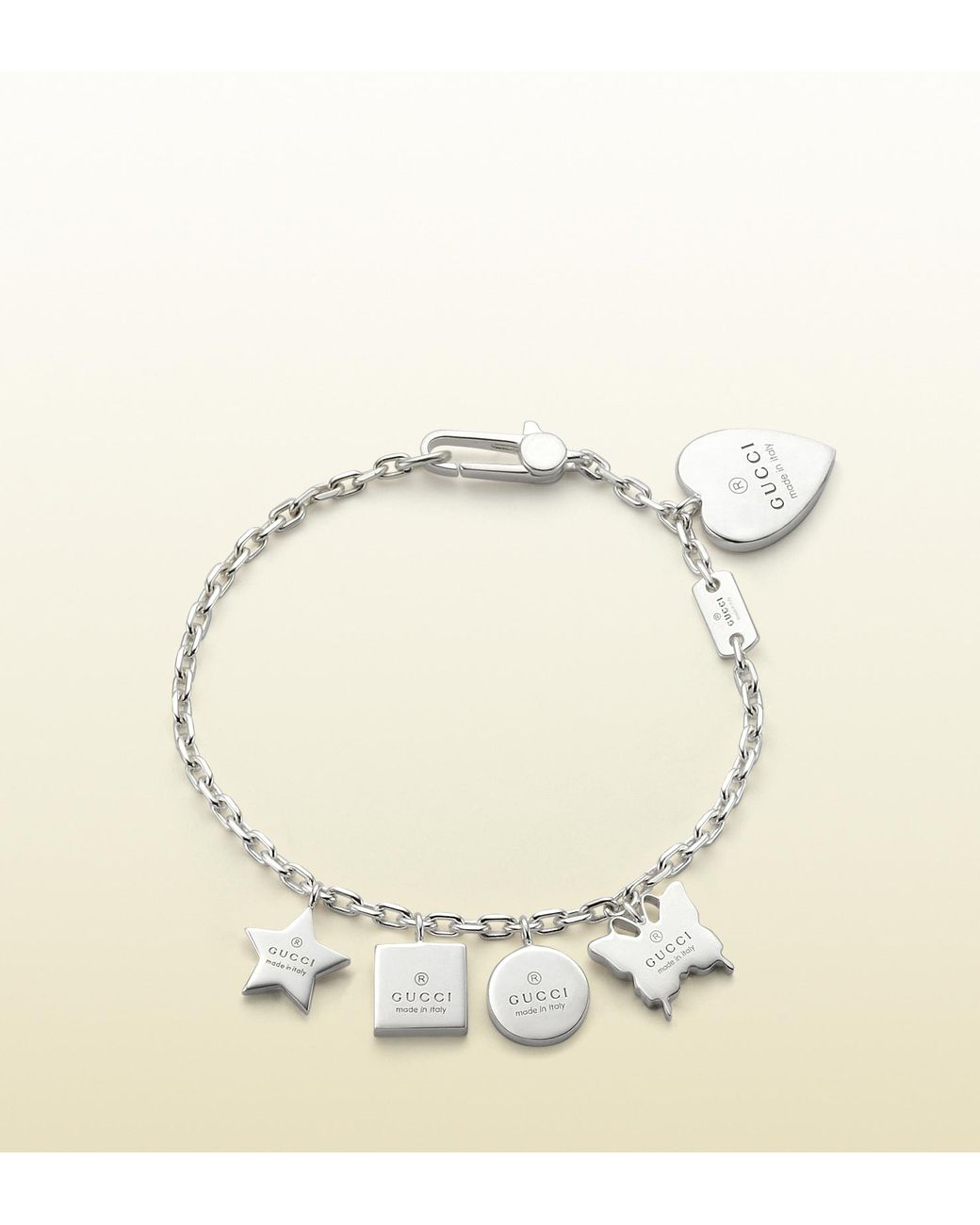 Gucci Bracelet with Gucci Trademark Engraved Charms in Metallic