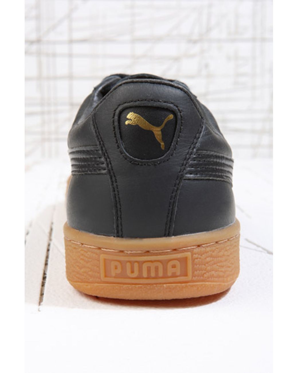 black leather puma trainers