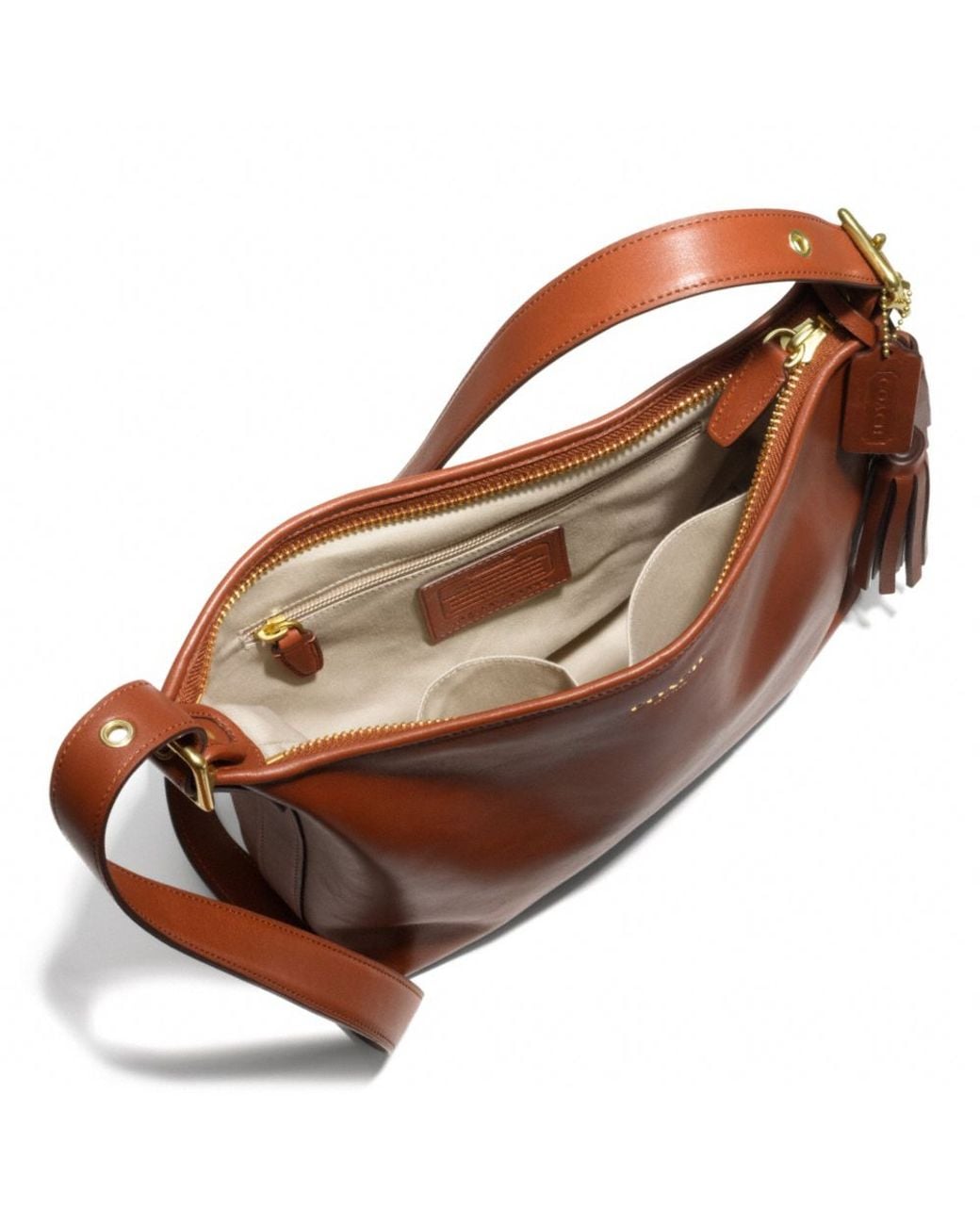 COACH Legacy Eastwest Duffle in Leather in Brown | Lyst