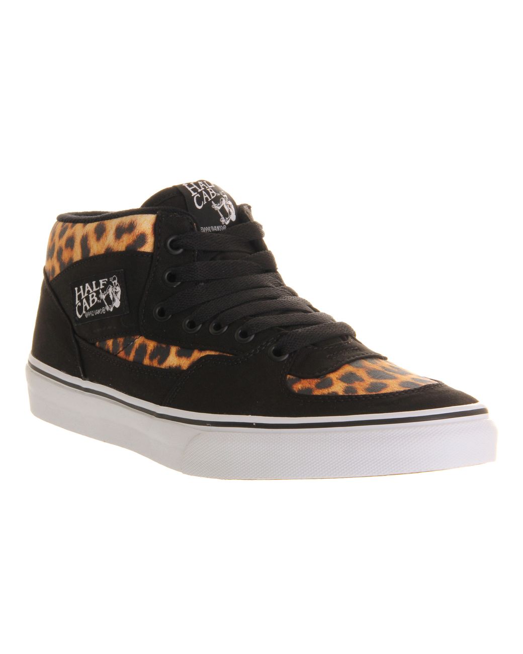 leopard vans black sole