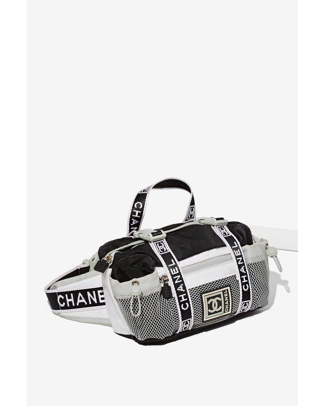 Preowned Chanel Sport Mini Duffel Bag 545  liked on Polyvore featuring  bags luggage chanel and black  Chanel luggage Chanel 3 Duffel