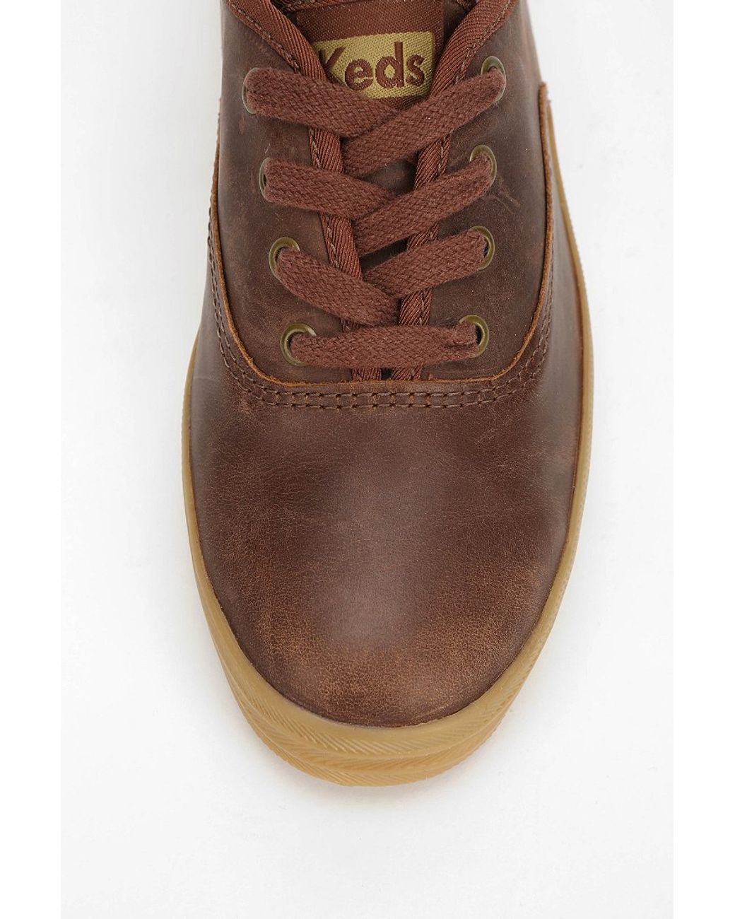 brown leather keds