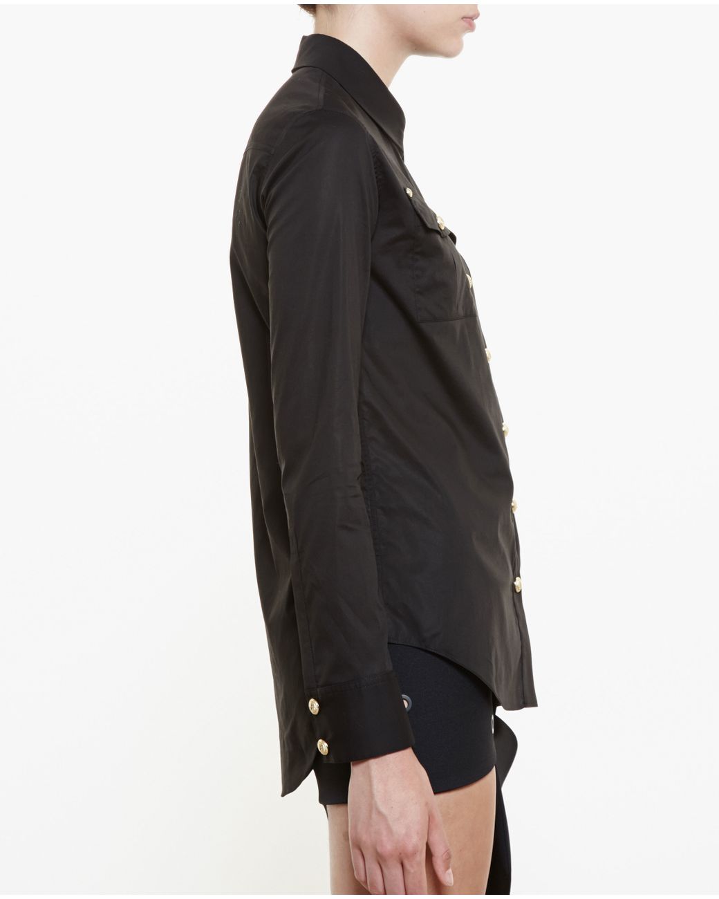 black long sleeve top with gold buttons