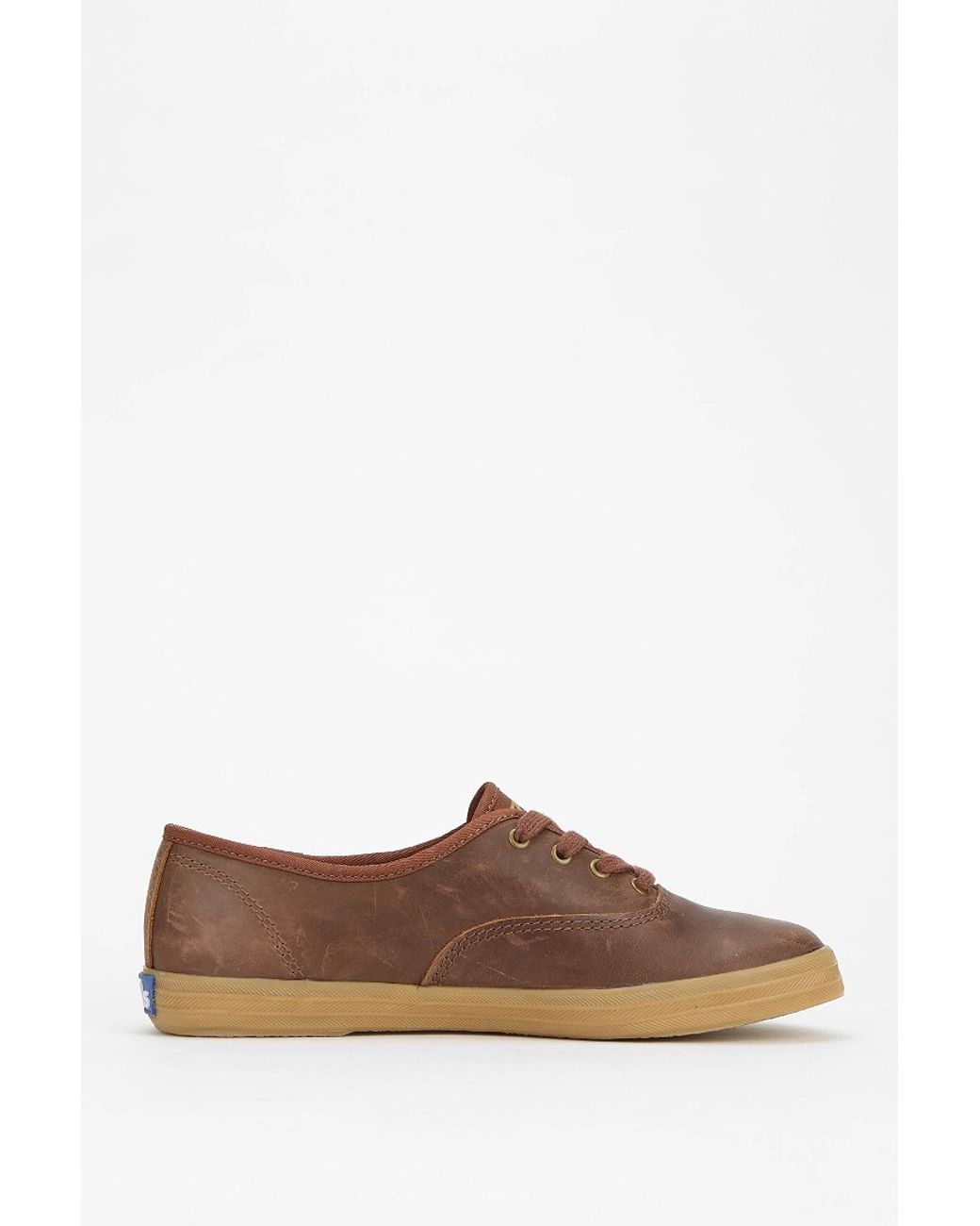 brown leather keds