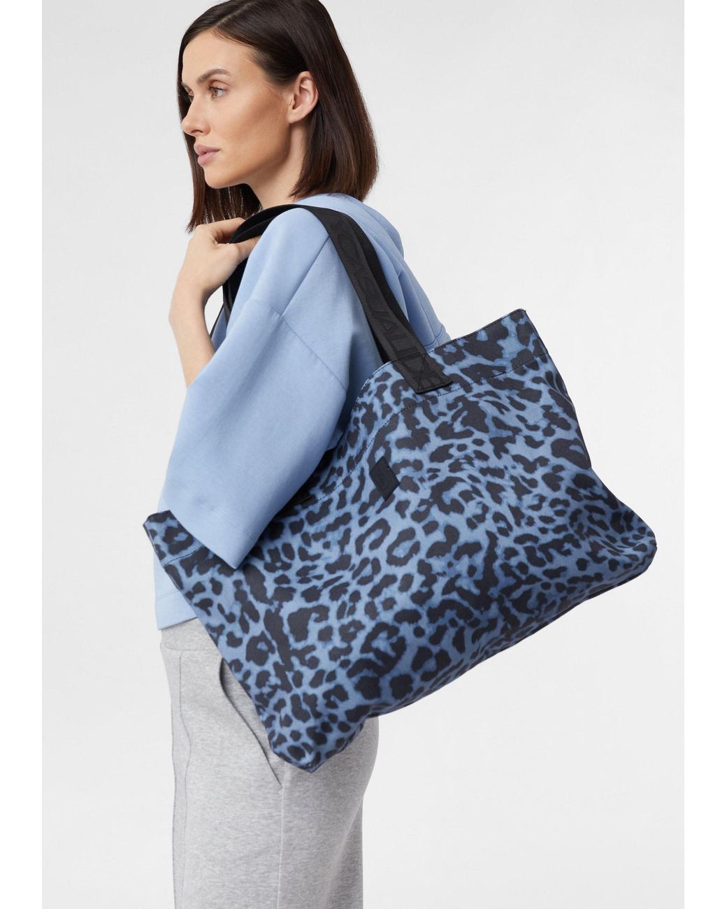 comma casual identity Blue Shopper