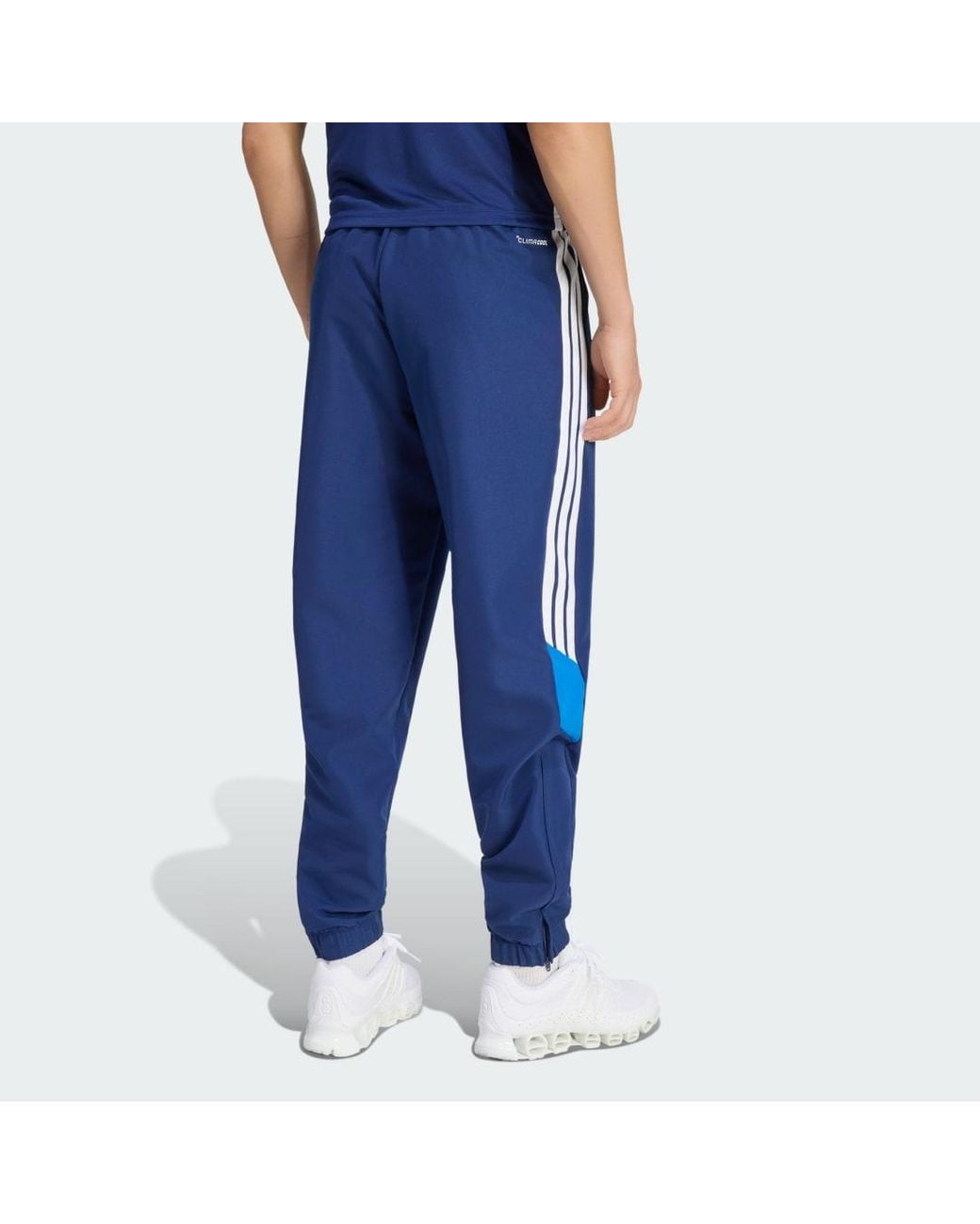 Adidas Blue Tiro 26 Essentials Woven Tracksuit Bottoms for men
