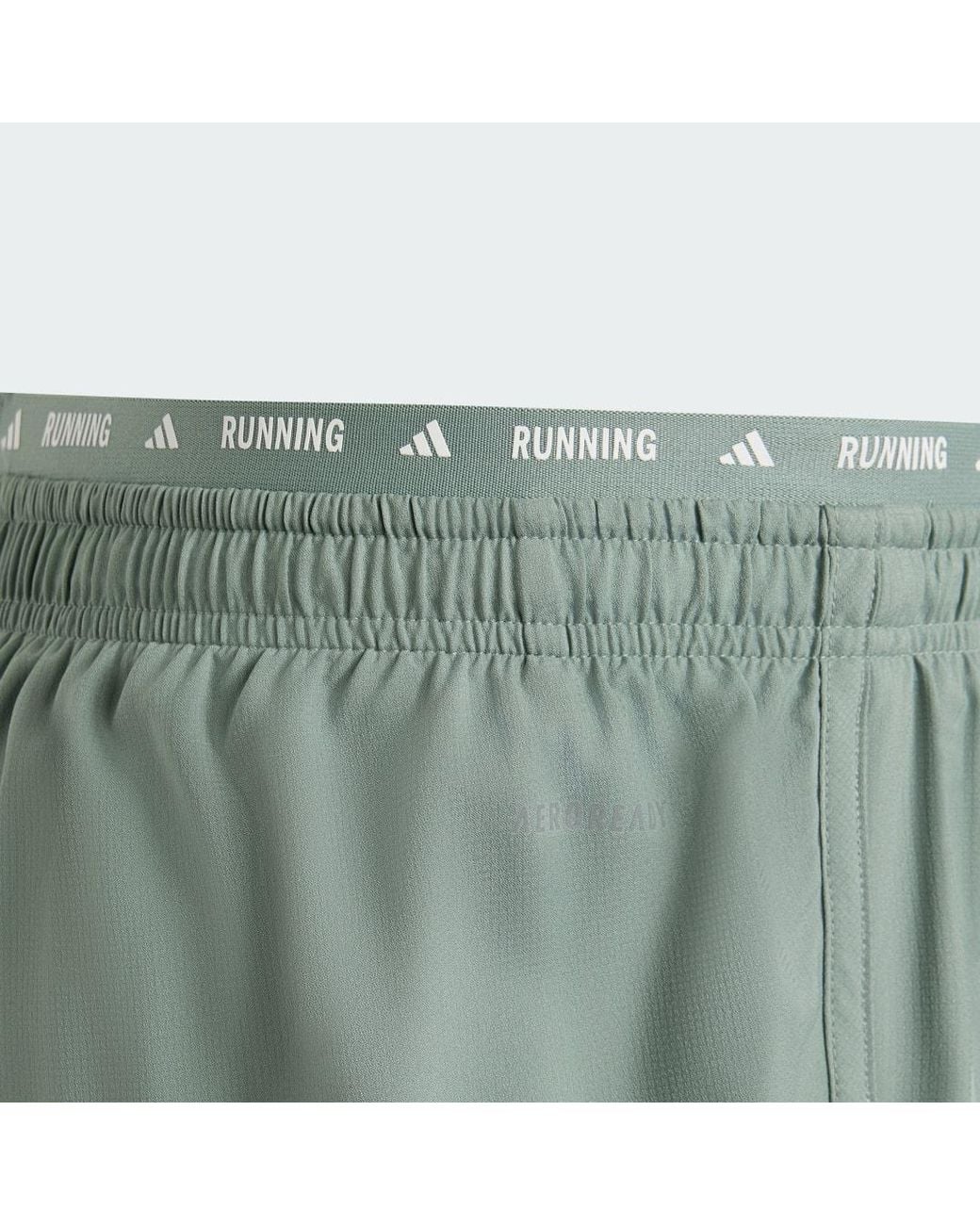 Adidas Originals Green Own The Run 3-Stripes 2-In-1 Shorts for men