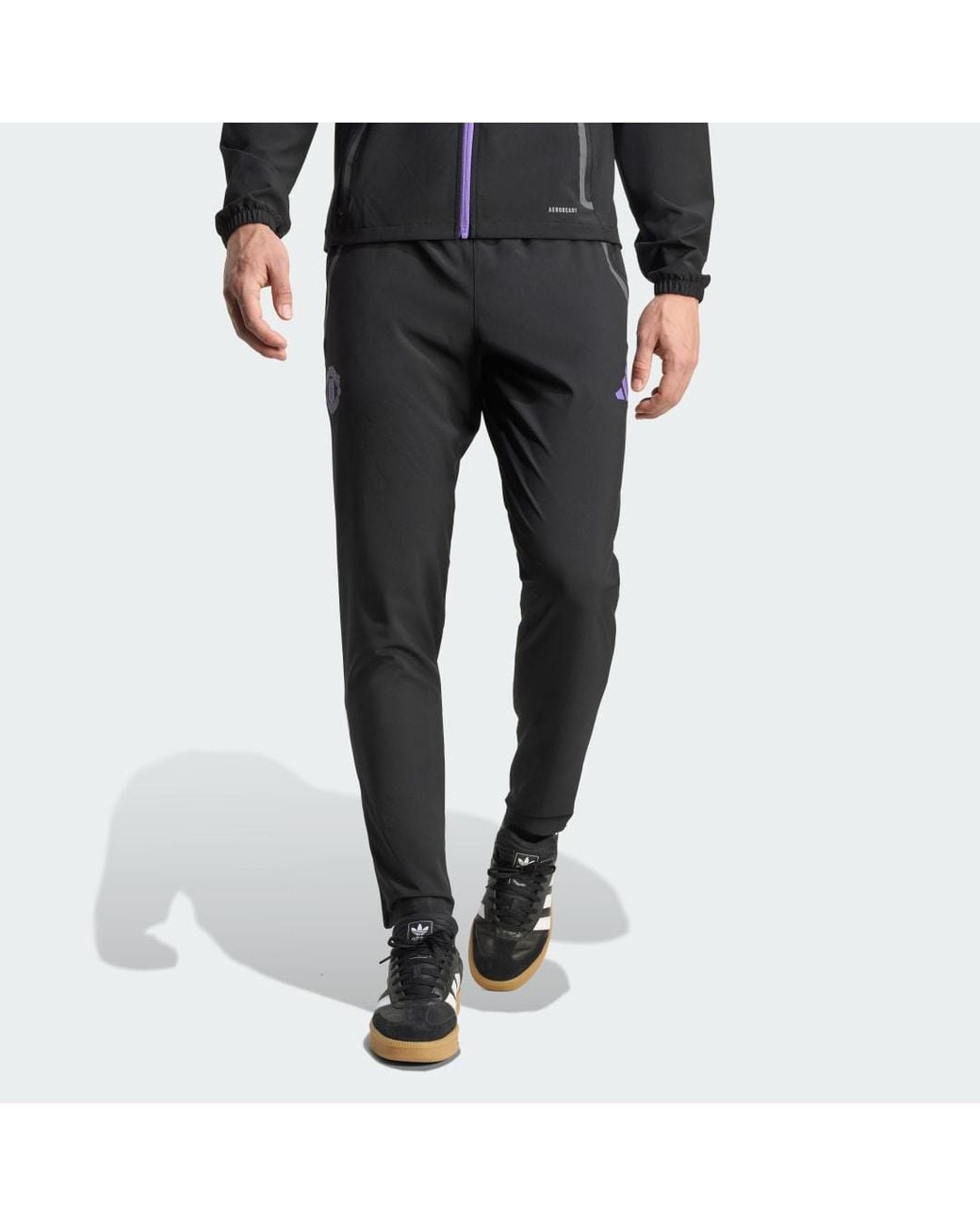 Adidas Black Manchester United Tiro 25 Competition Vis Tech Travel Pants for men