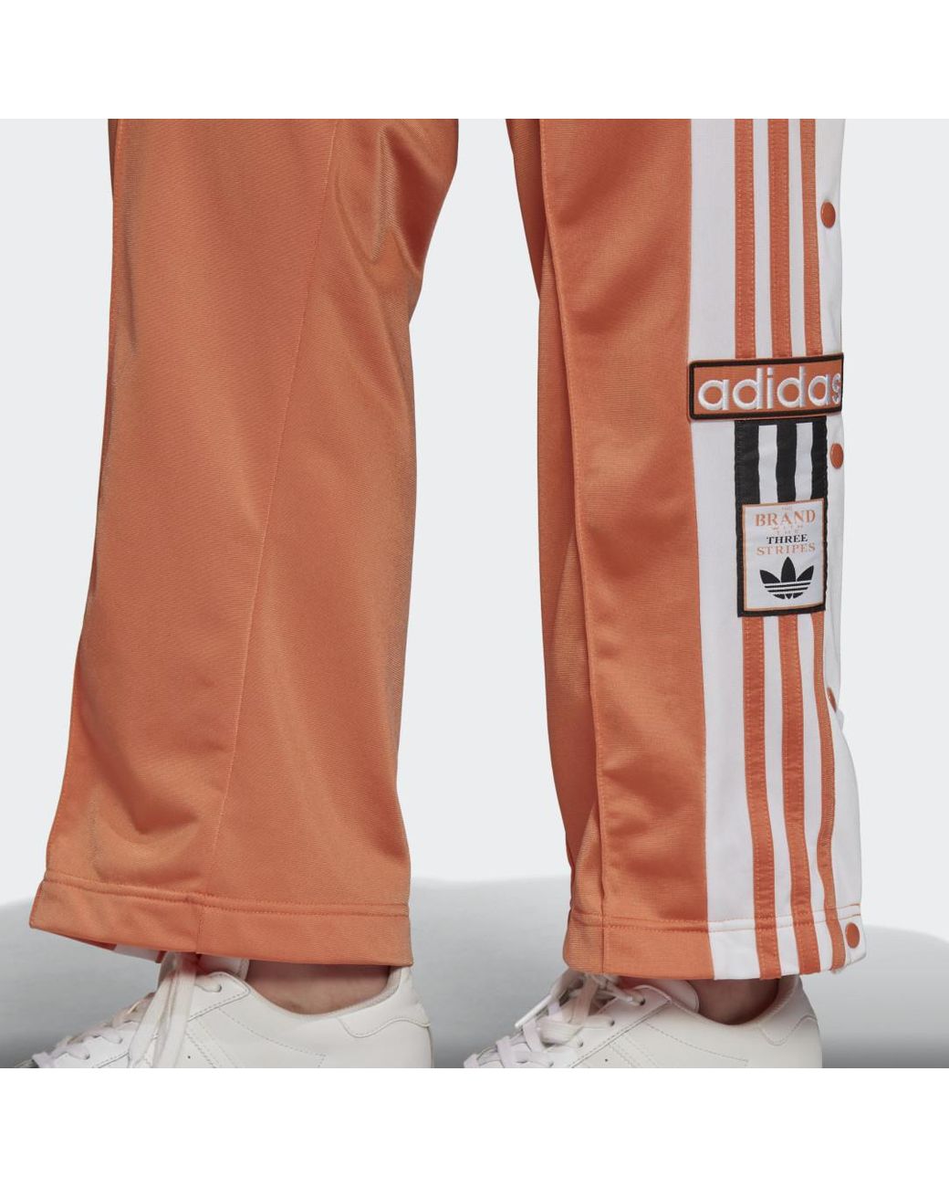 Pantalón Adicolor Classics Adibreak (Tallas grandes) adidas de Tejido  sintético de color Naranja | Lyst